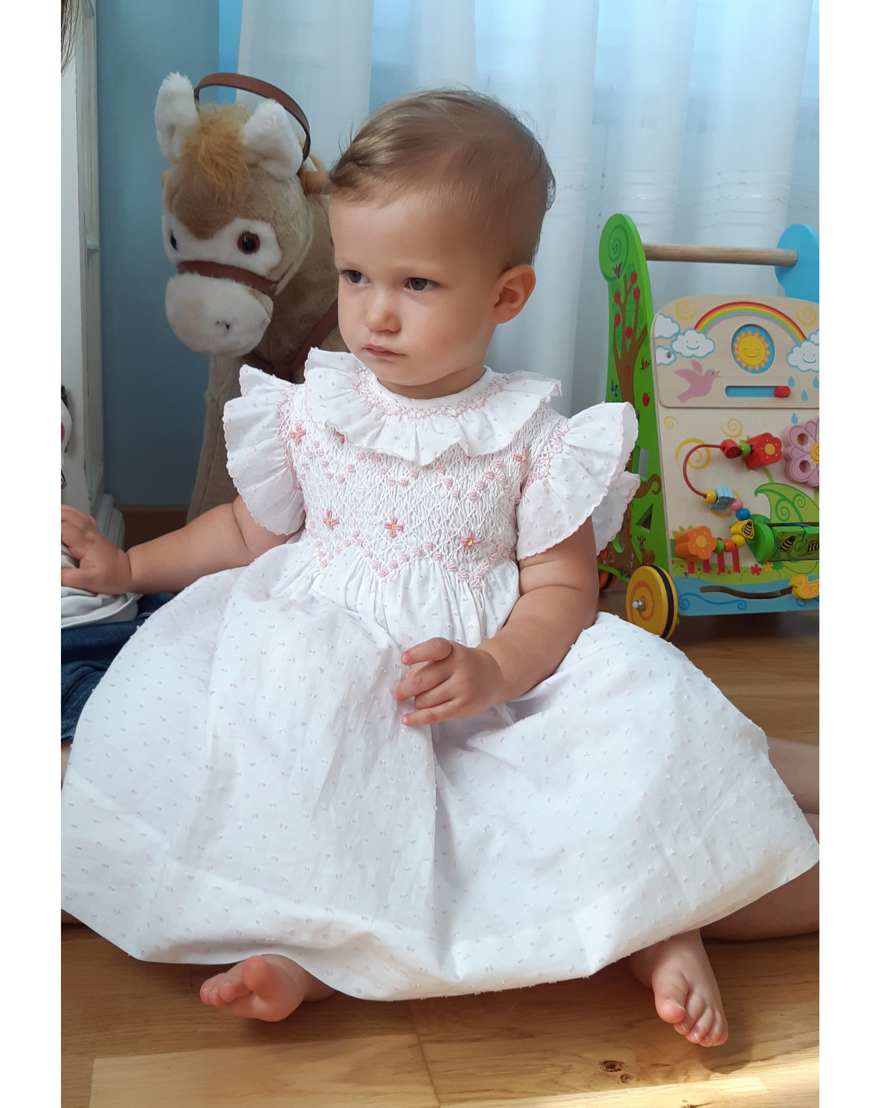 Abito per bambina con smock e roselline ricamate Frida