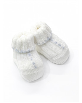 Scarpette per neonato ricamate a mano in pura lana merinos.