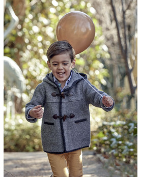 Montgomery per bambino in lana cotta merinos 100%. Grigio chiaro con bordi grigio scuro.