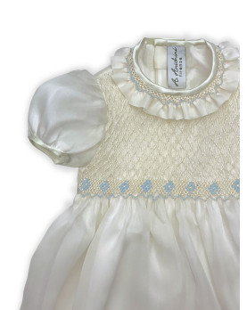 Baby silk romper with blue smocked bodice