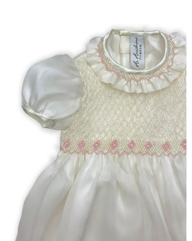 Baby silk romper with pink smocked bodice
