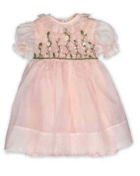 Flora  smocked girl dress in silk organdis with a an embroidered flowery meadow.