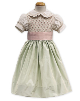 Abito Atena in shantung di seta verde acqua con ricamo punto smock fatto a mano.