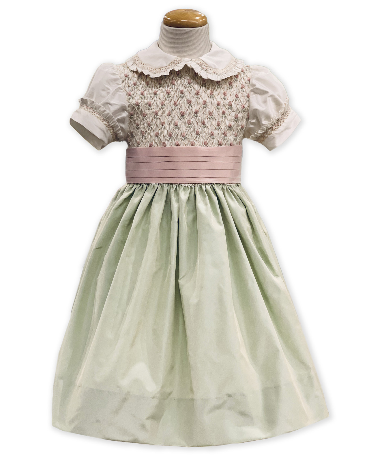 Abito Atena in shantung di seta verde acqua con ricamo punto smock fatto a mano.