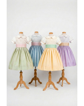 Varianti colore abito Atena in seta shantung con ricami punto smock Anichini.