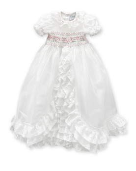 "The timeless elegance of the Maia gown: pure silk organza and Valenciennes lace, entirely handmade in Florence."